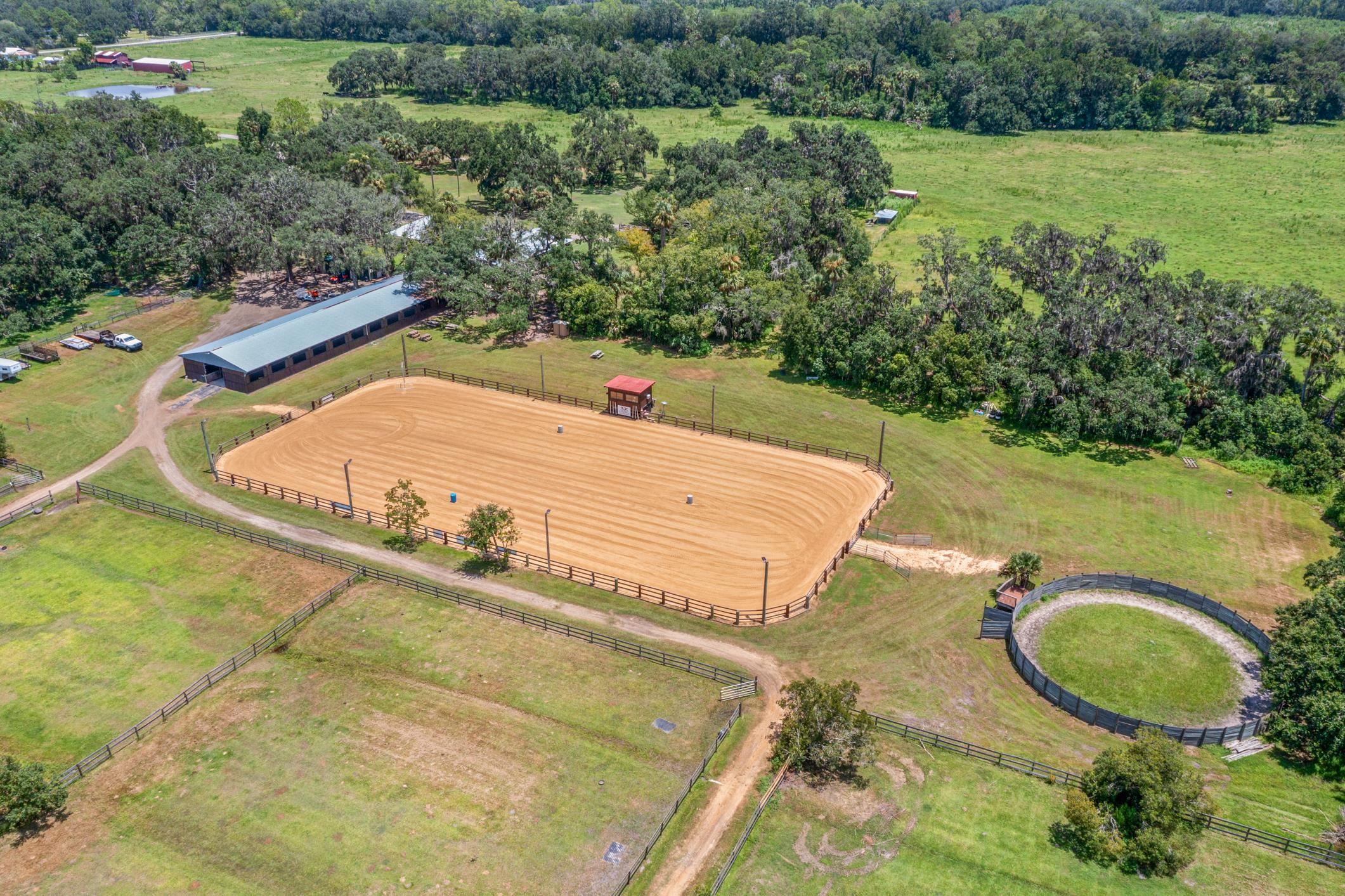 5210 County Road 305 Bunnell, FL 32110 - Photo 73 of 79 a view of a swimming pool with a yard and outdoor seating