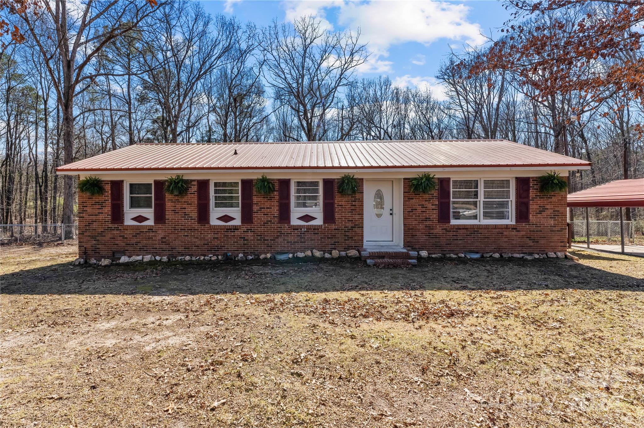1267 Oak Hill Road Chester, SC 29706 - Photo 1 of 29 a front view of a house with a yard