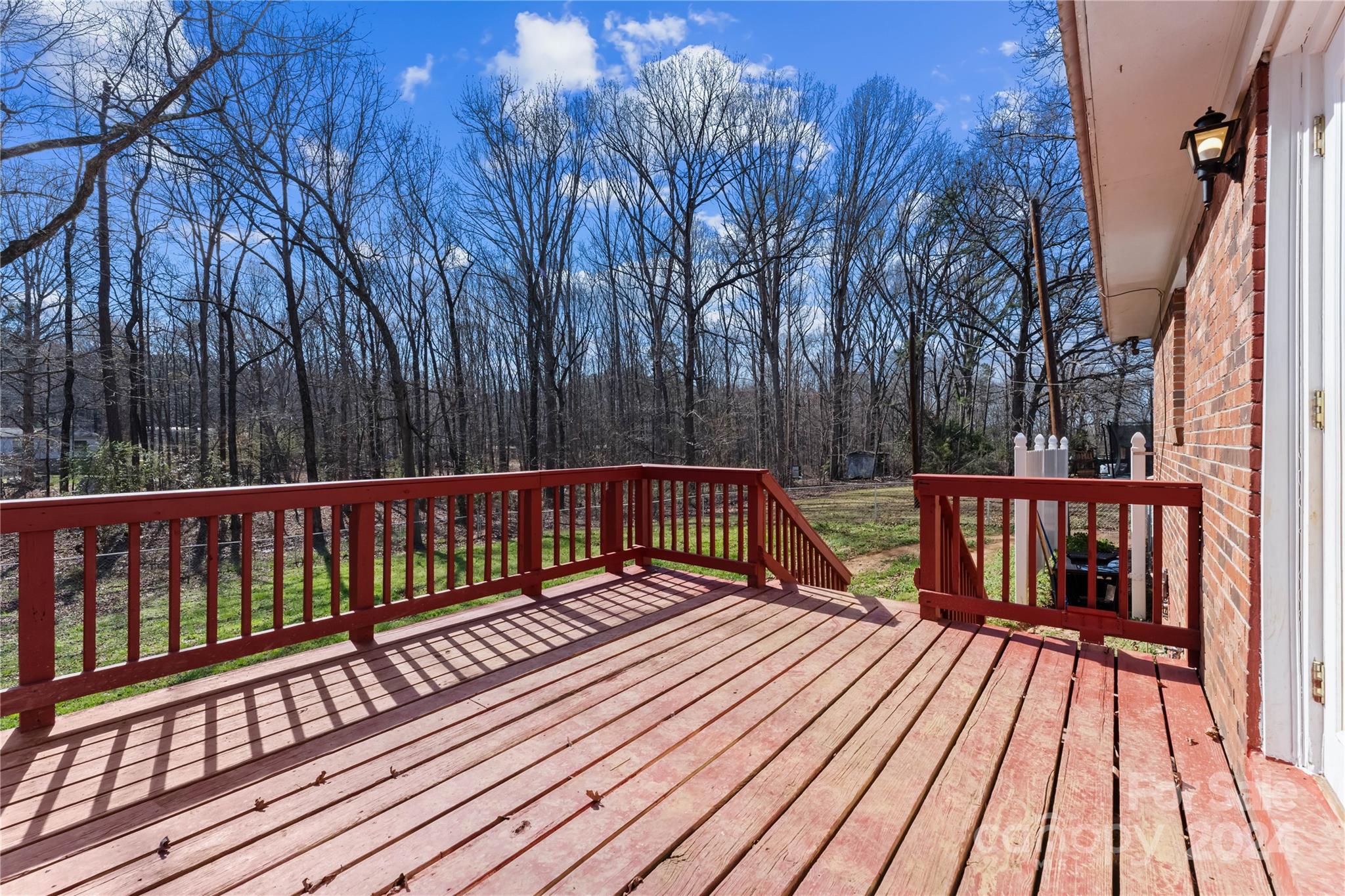 1267 Oak Hill Road Chester, SC 29706 - Photo 20 of 29 a balcony with wooden floor and trees