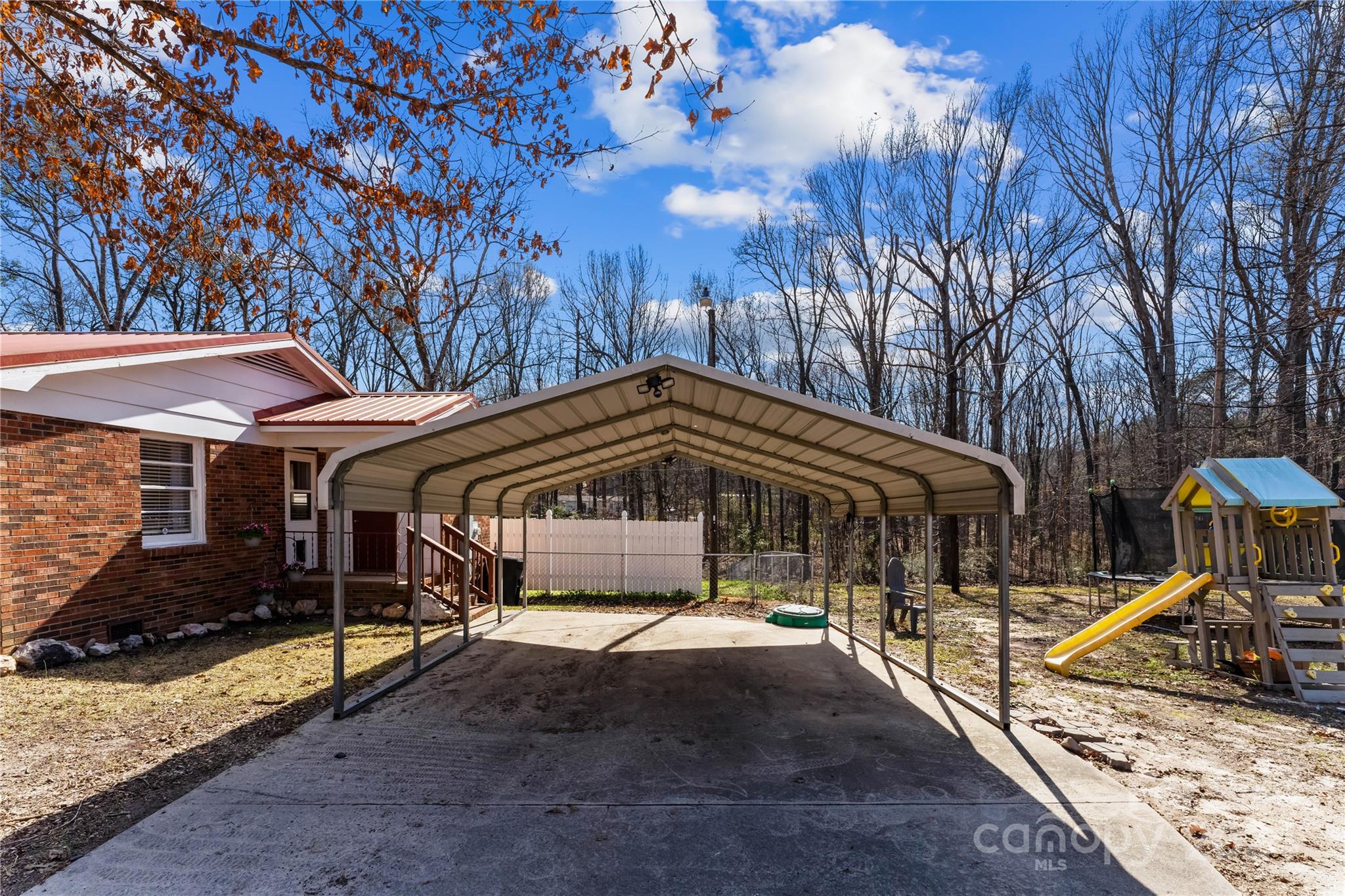 1267 Oak Hill Road Chester, SC 29706 - Photo 27 of 29 a view of a house with backyard and sitting area