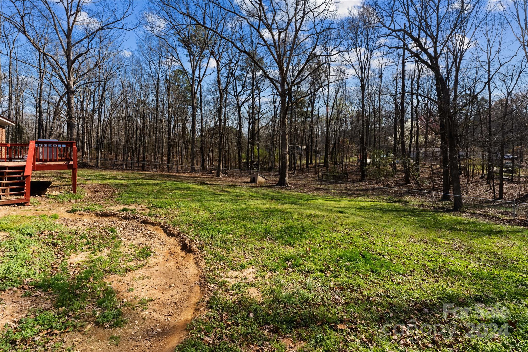 1267 Oak Hill Road Chester, SC 29706 - Photo 28 of 29 a backyard of a house with swimming pool and large trees