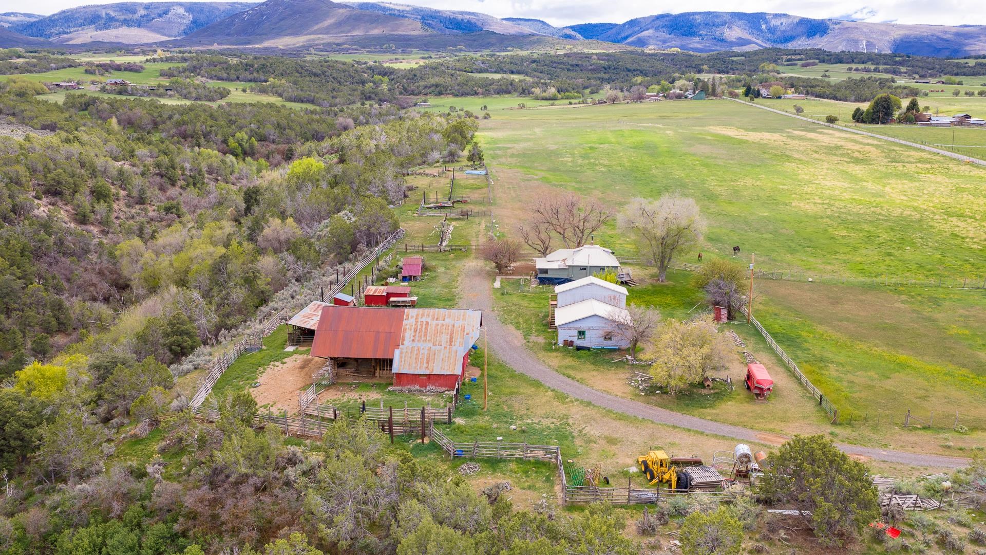 11260 54 7/10 Road Molina, CO 81646 - Photo 22 of 31 an aerial view of residential houses with outdoor space