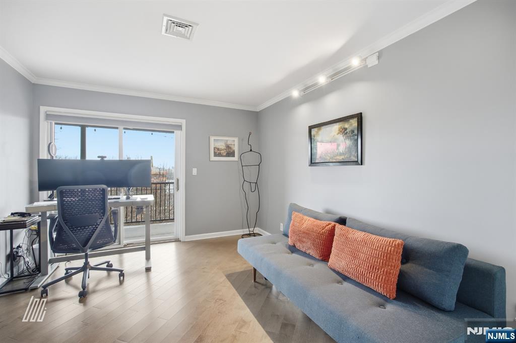 300 Gorge Road, Unit 75 Cliffside Park, NJ 07010 - Photo 19 of 27 a living room with furniture and a window
