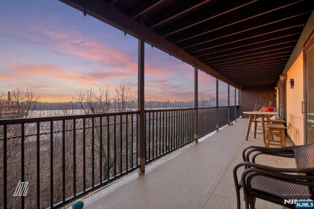 300 Gorge Road, Unit 75 Cliffside Park, NJ 07010 - Photo 2 of 27 a view of a balcony with furniture