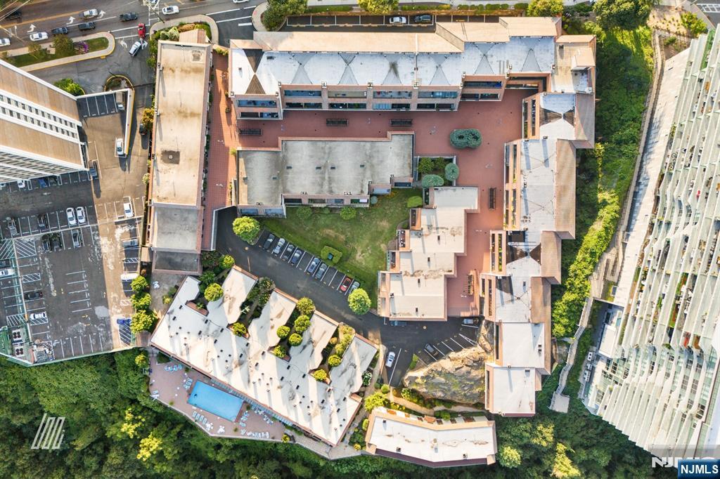 300 Gorge Road, Unit 75 Cliffside Park, NJ 07010 - Photo 23 of 27 an aerial view of residential houses with outdoor space