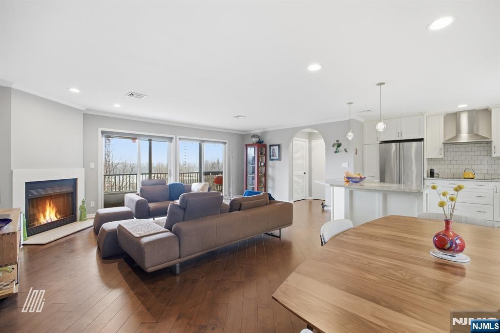 300 Gorge Road, Unit 75 Cliffside Park, NJ 07010 - Photo 5 of 27 a living room with furniture and a fireplace