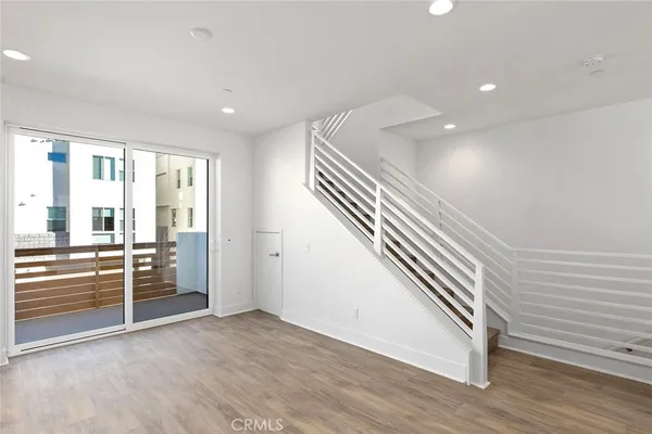 wooden floor and an entryway in a room