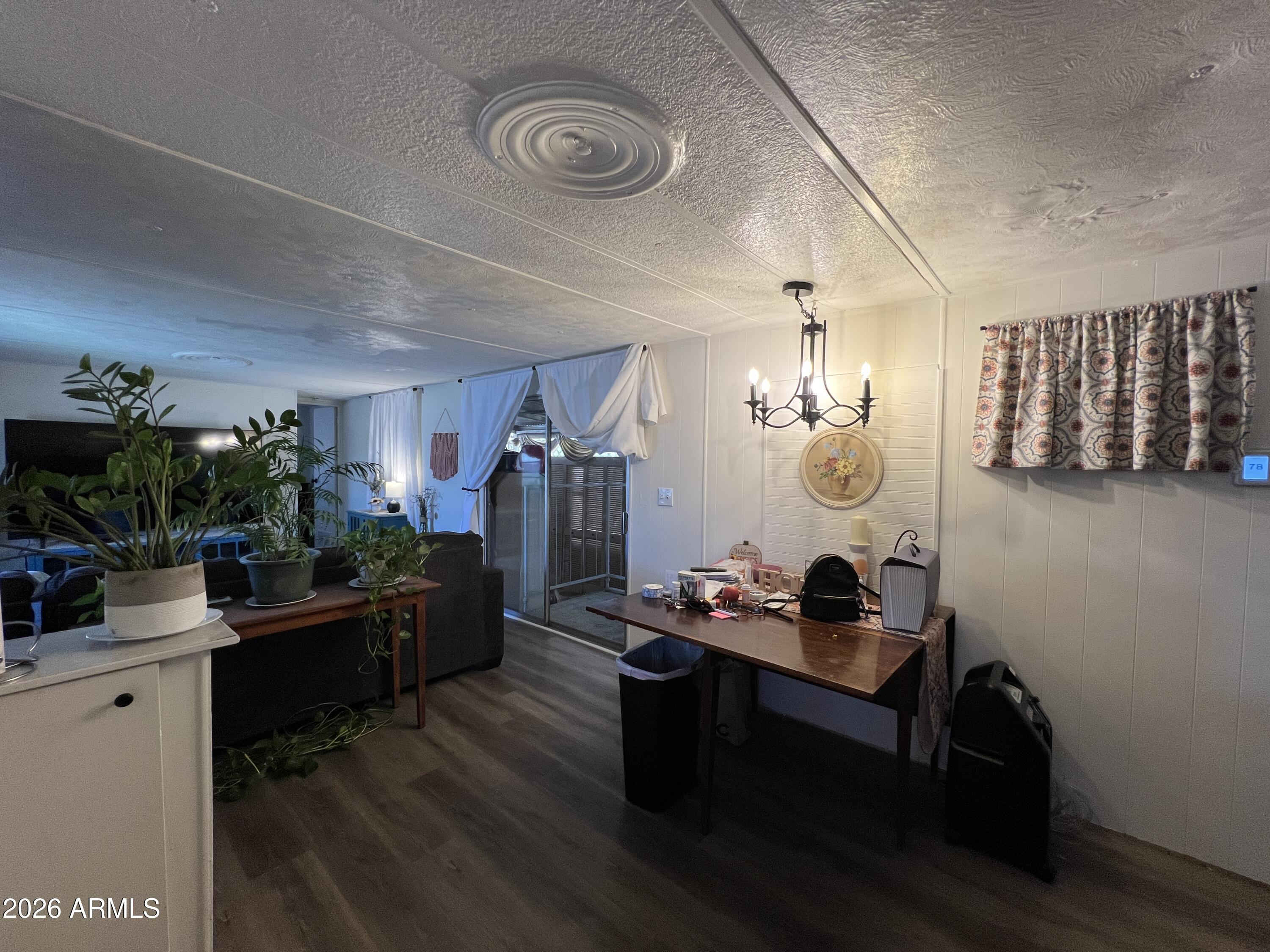 19225 North Cave Creek Road, Unit 40 Phoenix, AZ 85024 - Photo 12 of 21 a living room with furniture and wooden floor