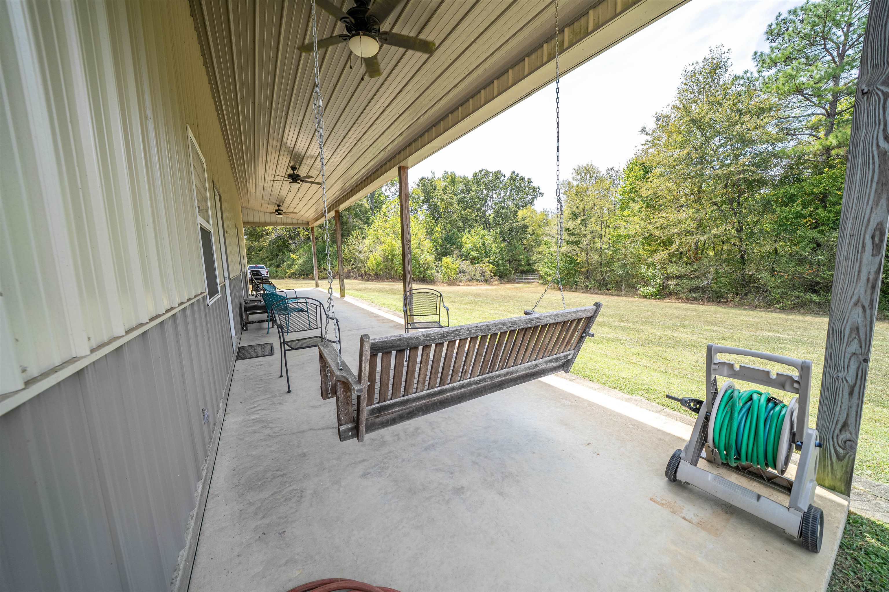 1485 Walton Road Bolivar, TN 38008 - Photo 3 of 23 a view of a room with porch and wooden floor