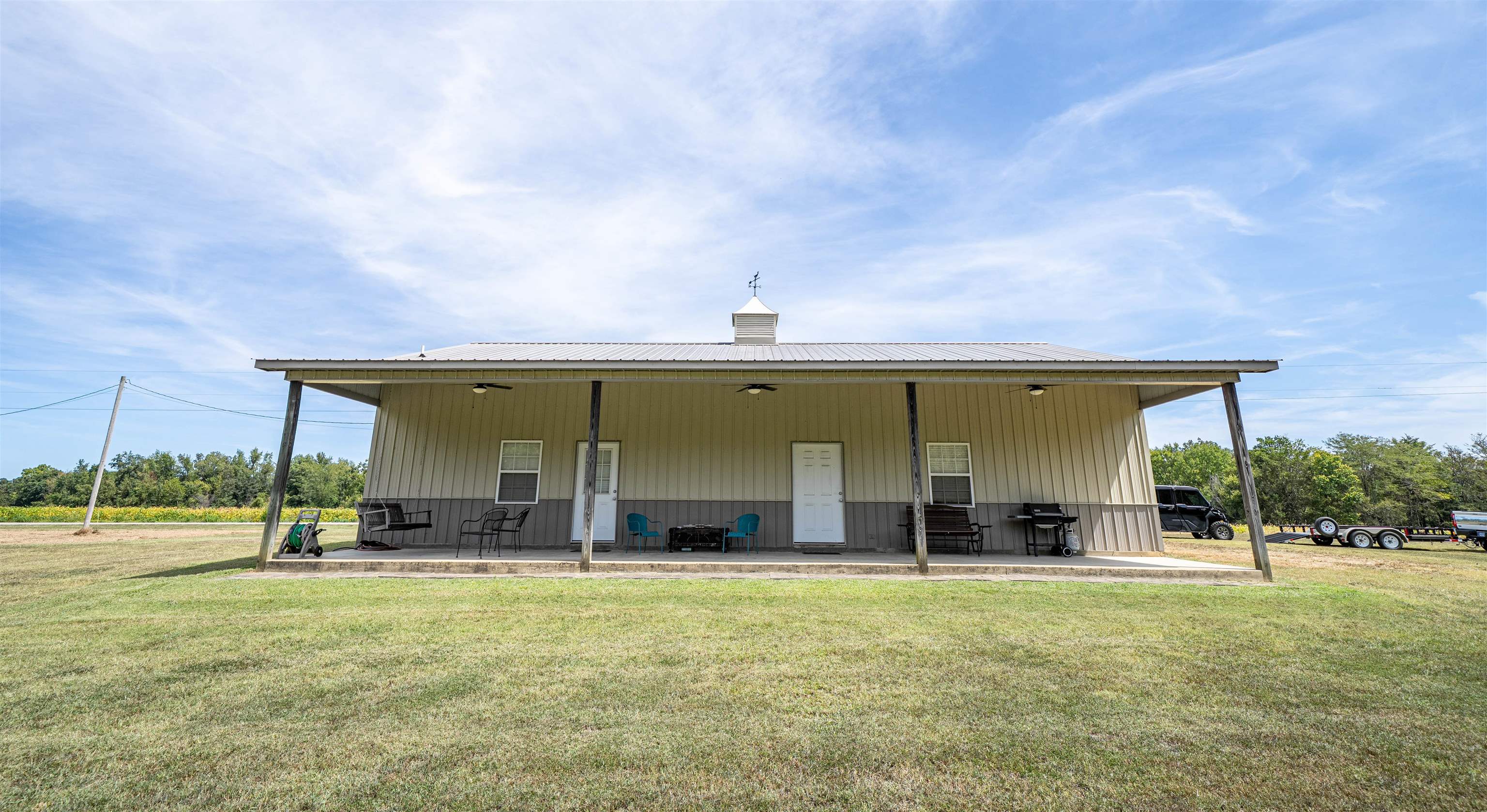 1485 Walton Road Bolivar, TN 38008 - Photo 4 of 23 a view of a house with a backyard and a porch
