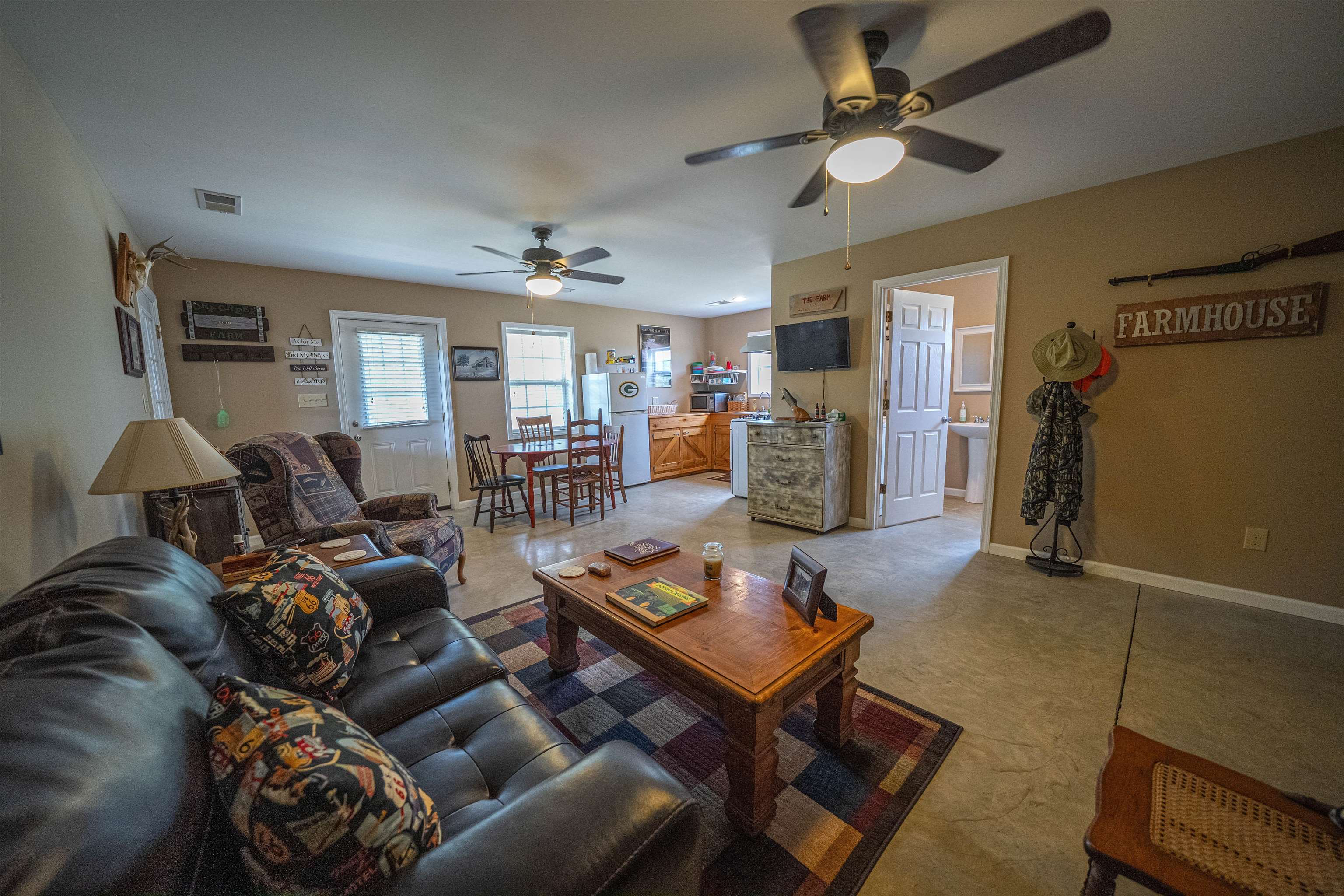 1485 Walton Road Bolivar, TN 38008 - Photo 7 of 23 a living room with furniture and wooden floor