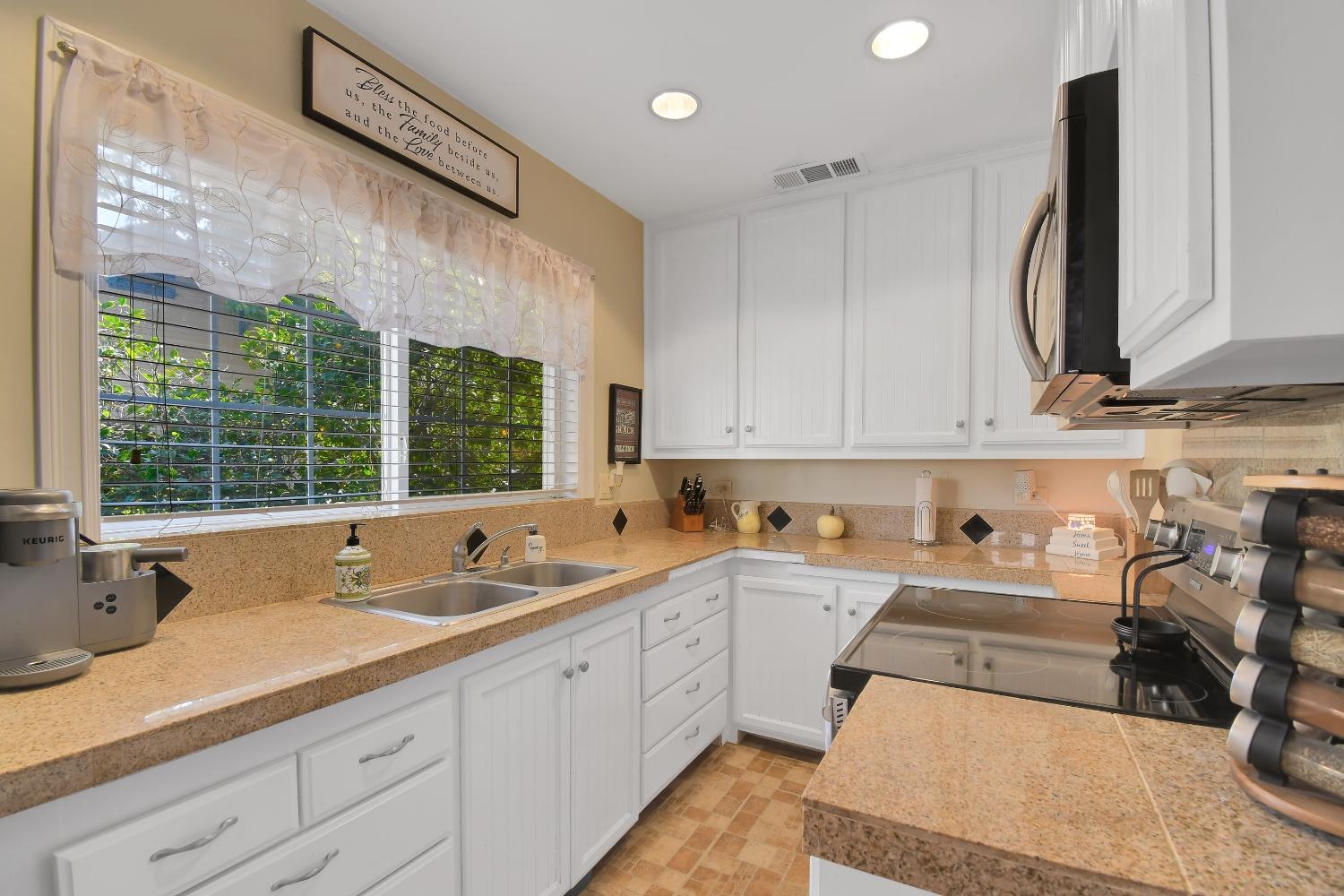 1750 Hazel Street Gridley, CA 95948 - Photo 13 of 20 a kitchen with a sink and a window