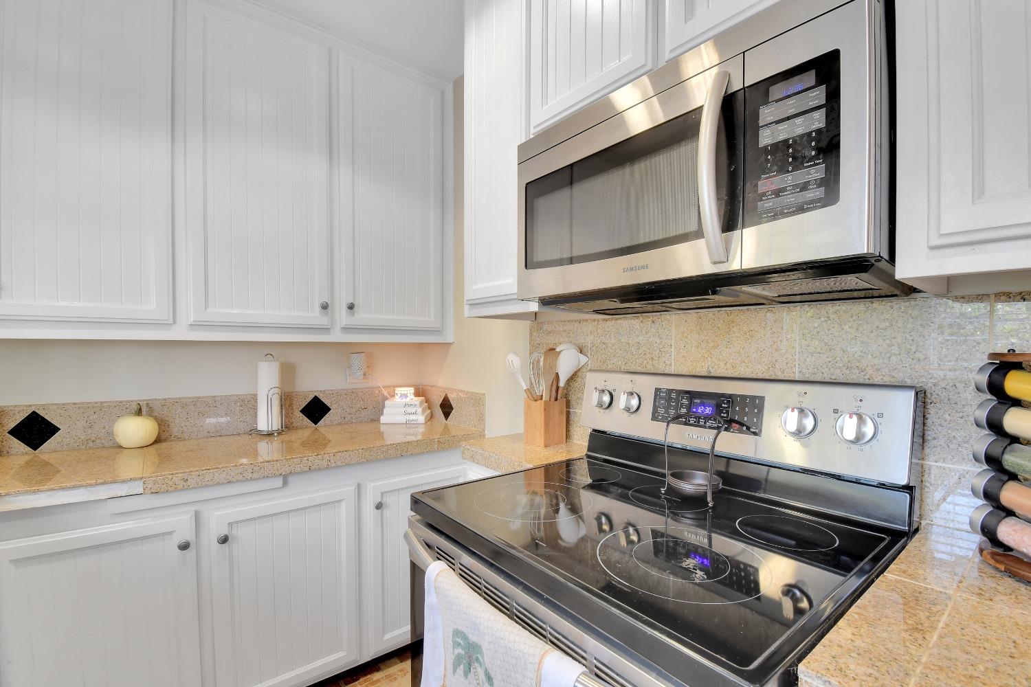 1750 Hazel Street Gridley, CA 95948 - Photo 15 of 20 a kitchen with a stove and cabinets