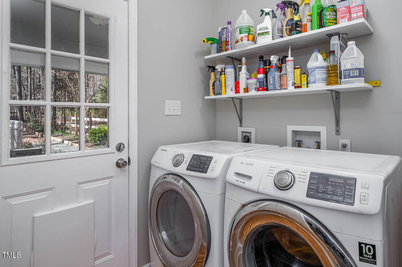 9501 Coachway Chapel Hill, NC 27516 - Photo 16 of 47 a view of washer and dryer in a utility room