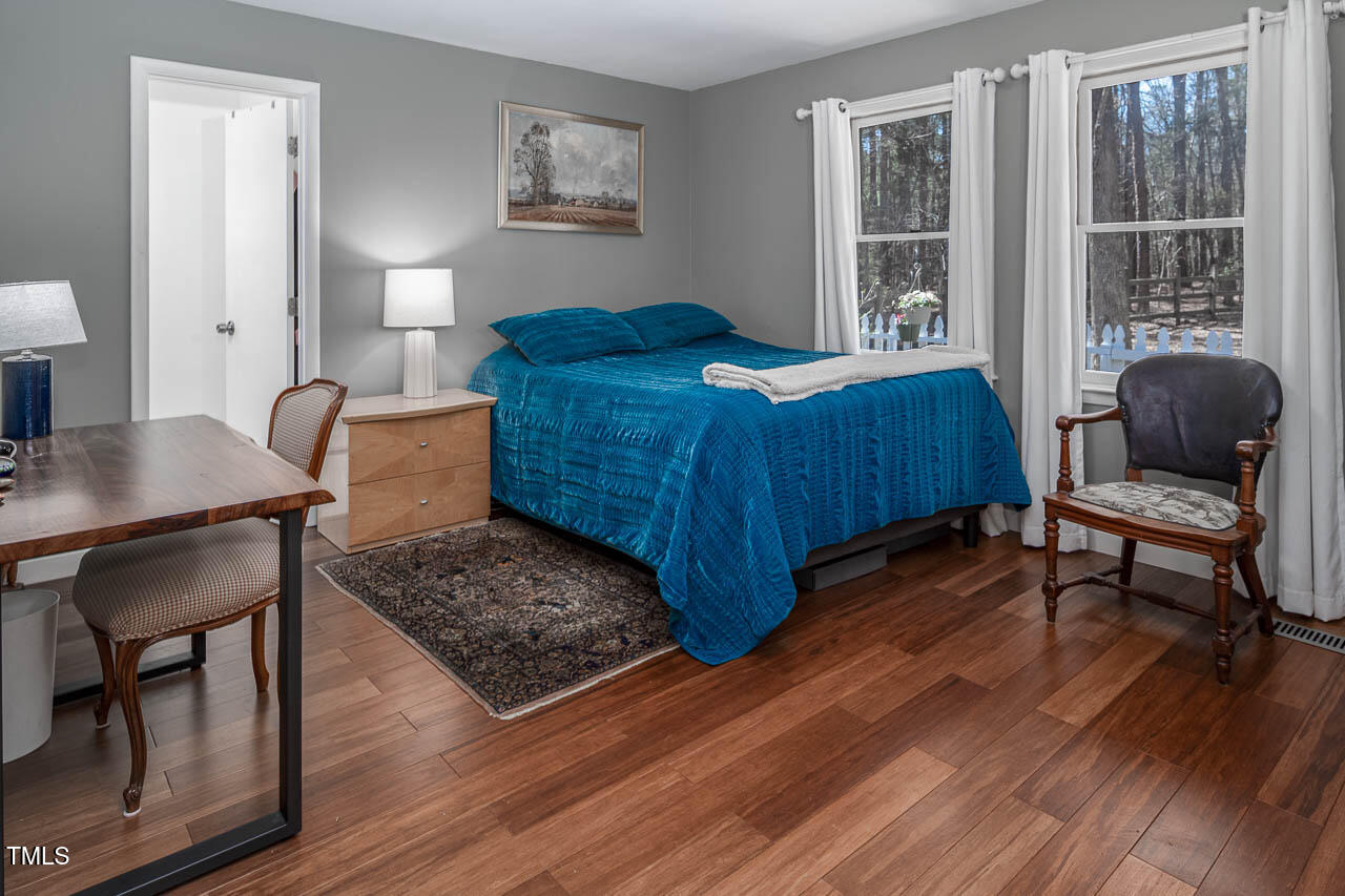 9501 Coachway Chapel Hill, NC 27516 - Photo 25 of 47 a living room with furniture and a window