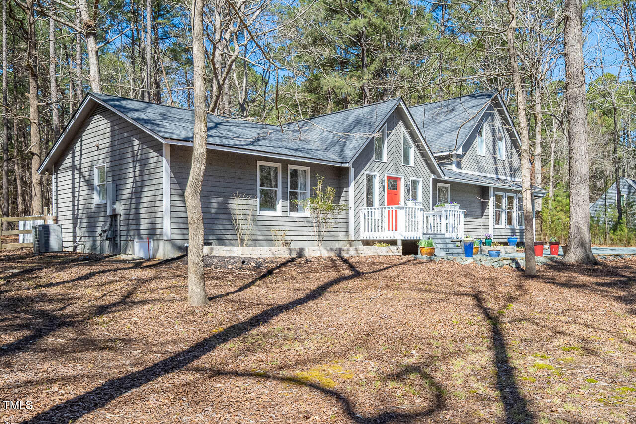 9501 Coachway Chapel Hill, NC 27516 - Photo 34 of 47 a front view of a house with entertaining space