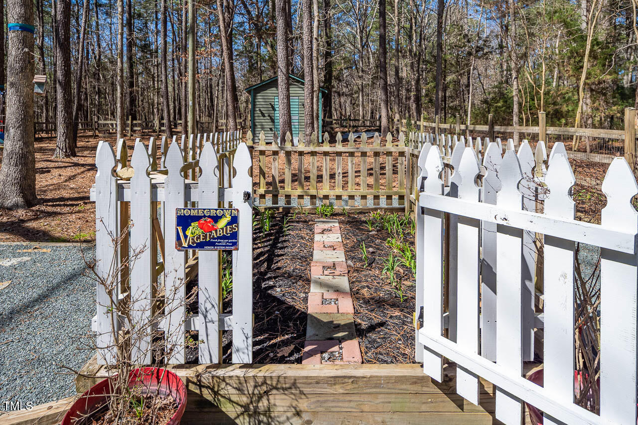 9501 Coachway Chapel Hill, NC 27516 - Photo 39 of 47 a view of entryway with outdoor