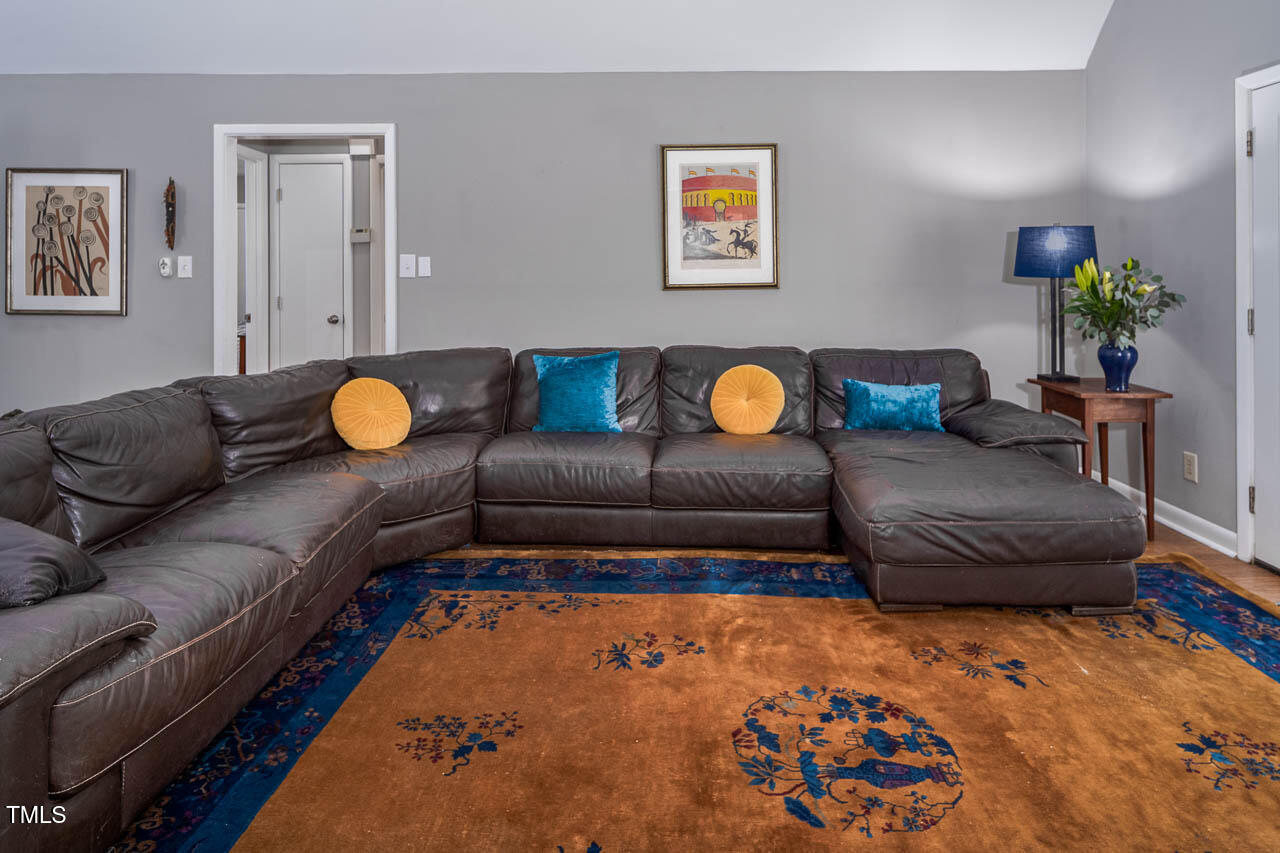 9501 Coachway Chapel Hill, NC 27516 - Photo 6 of 47 a living room with furniture and wooden floor