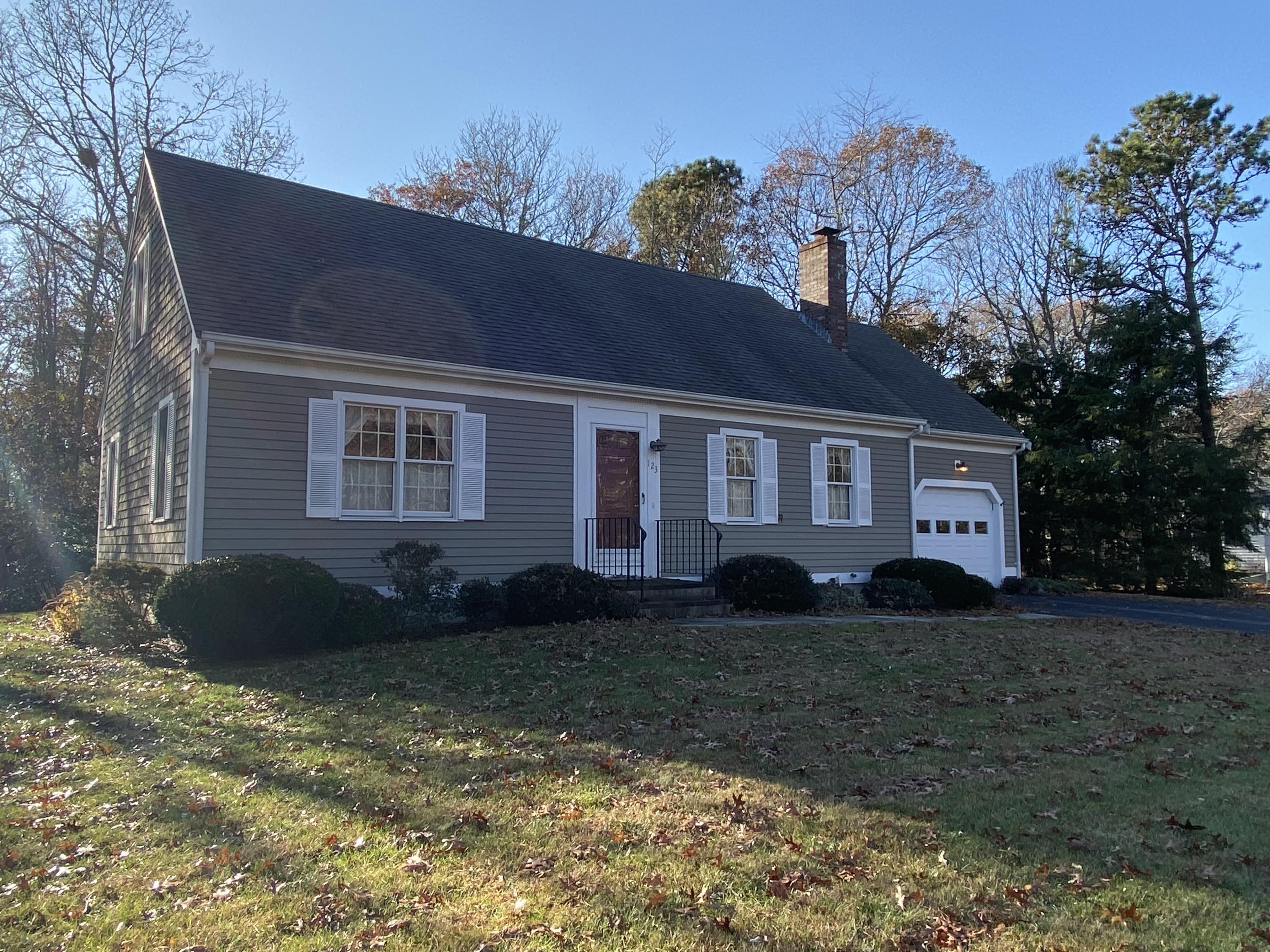 123 Camelback Road Marstons Mills, MA 02648 - Photo 1 of 30 a house that has a tree in front of a house