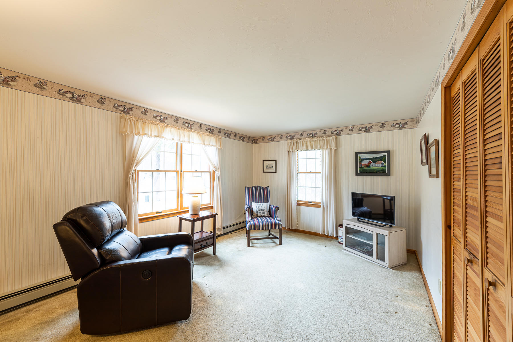 123 Camelback Road Marstons Mills, MA 02648 - Photo 12 of 30 a living room with furniture and a window