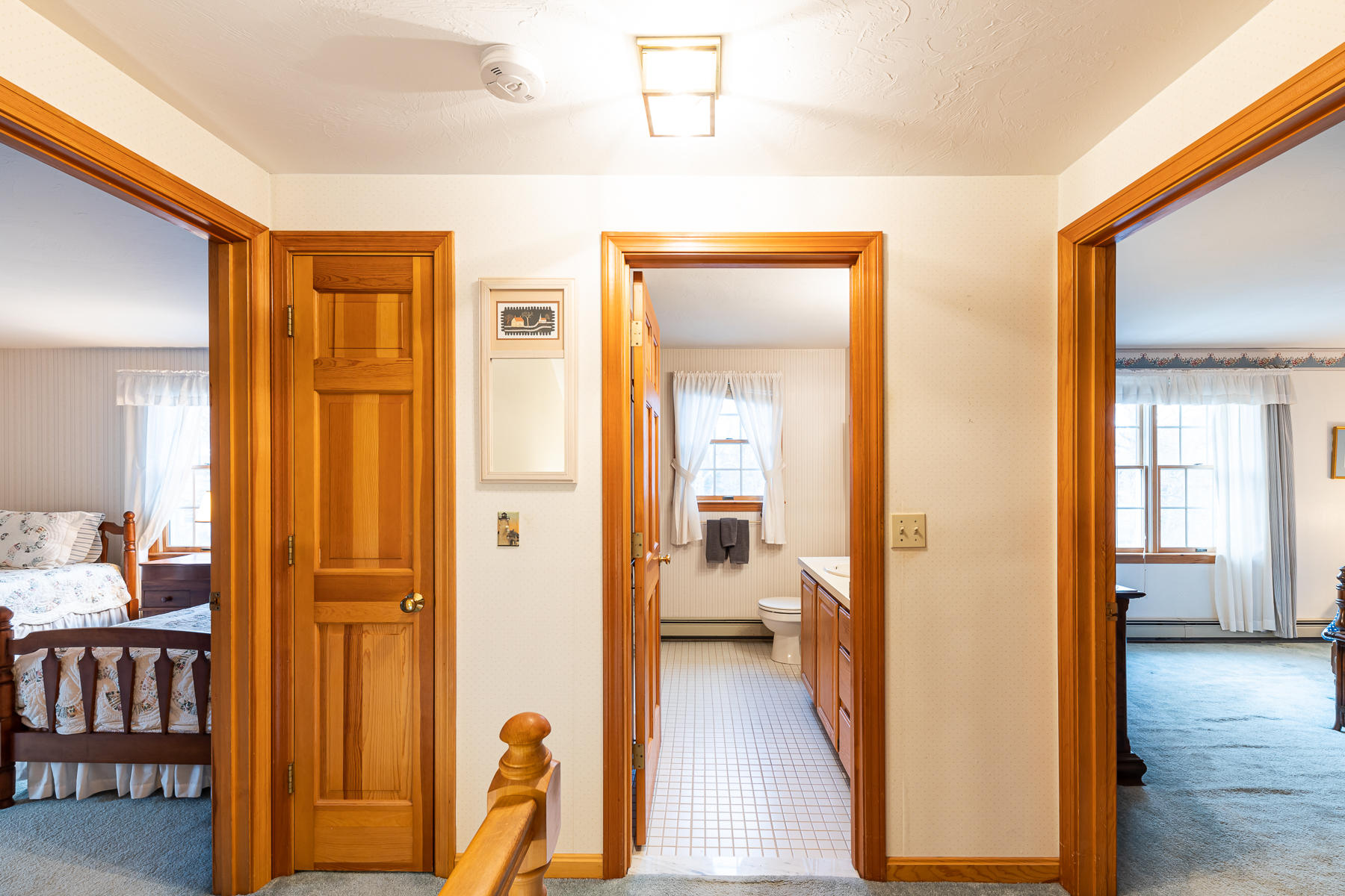 123 Camelback Road Marstons Mills, MA 02648 - Photo 13 of 30 a view of a bathroom from a hallway