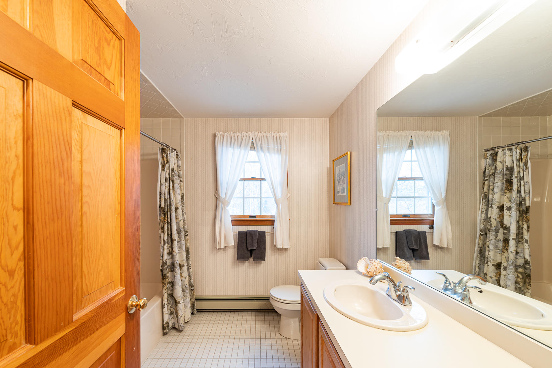 123 Camelback Road Marstons Mills, MA 02648 - Photo 14 of 30 a bathroom with a sink and a mirror