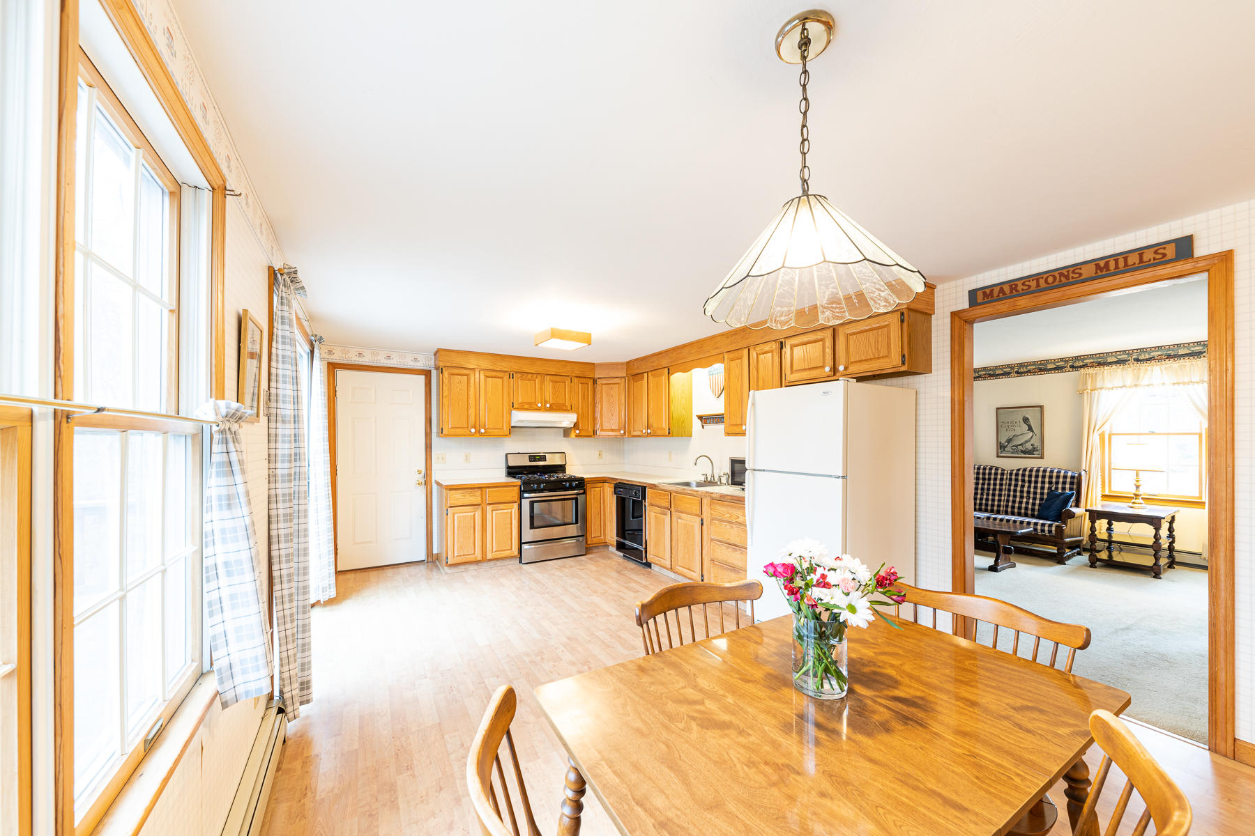 123 Camelback Road Marstons Mills, MA 02648 - Photo 6 of 30 a room with lots of table and chairs