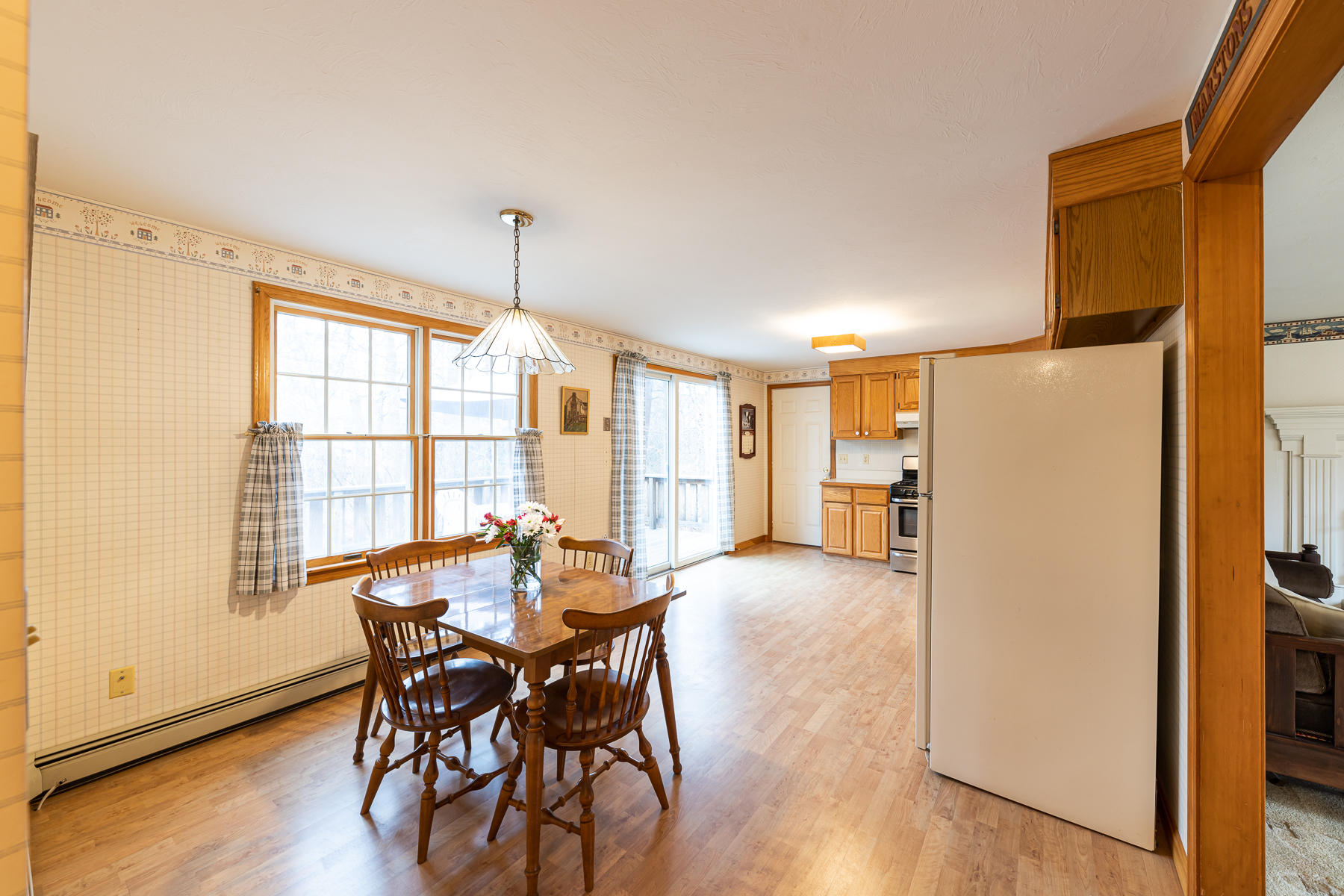 123 Camelback Road Marstons Mills, MA 02648 - Photo 7 of 30 a view of a dining room with furniture and wooden floor