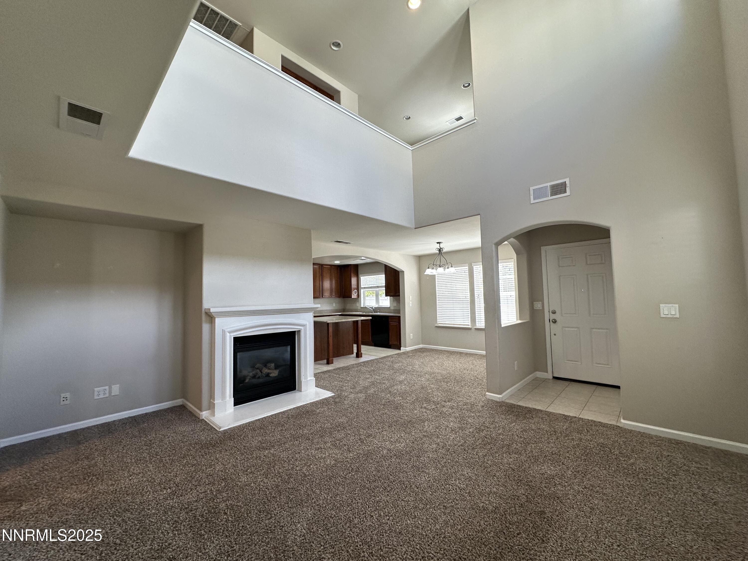 1625 Clover Hill Trail Reno, NV 89523 - Photo 11 of 41 a view of a livingroom with a fireplace