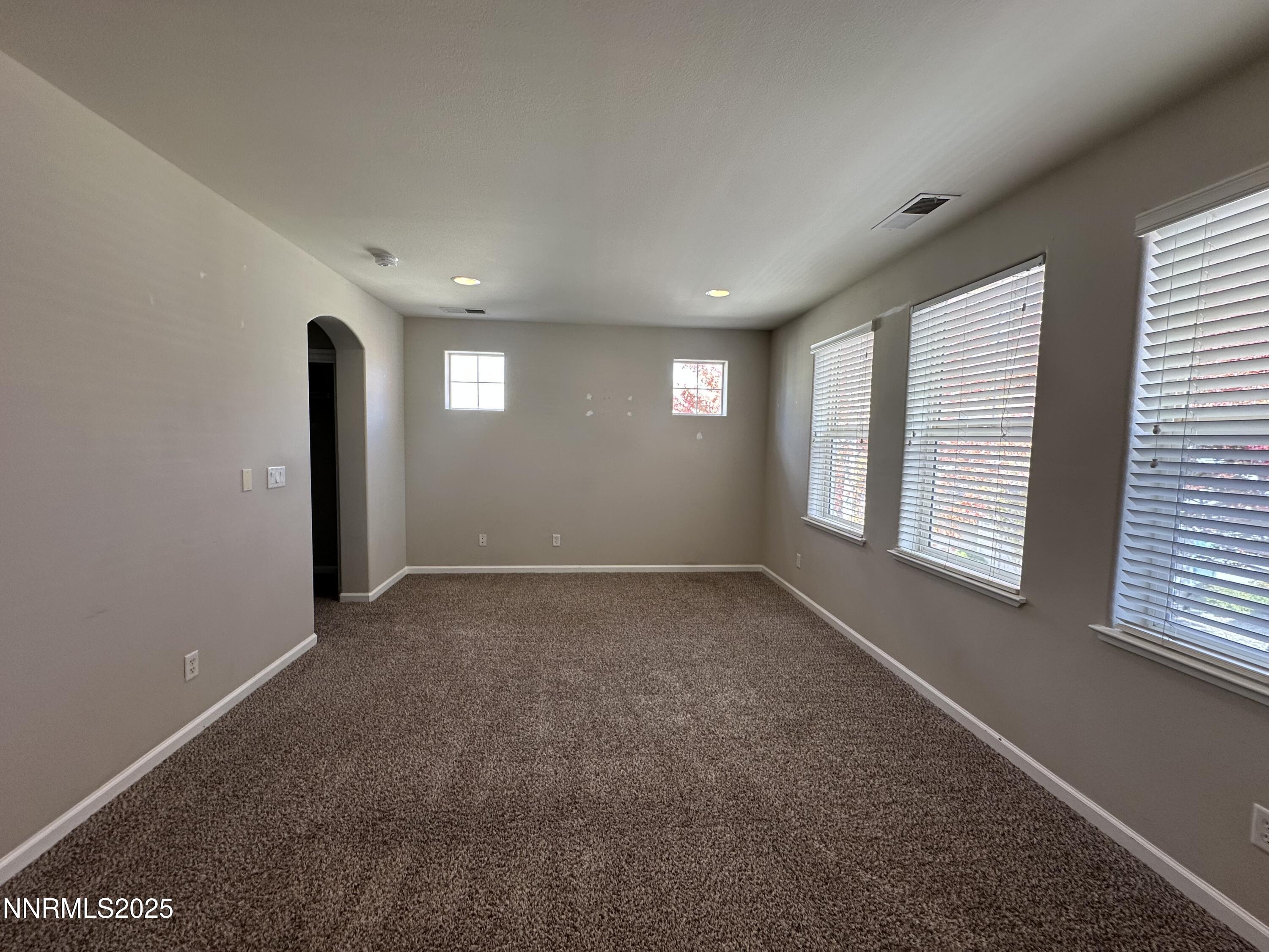 1625 Clover Hill Trail Reno, NV 89523 - Photo 18 of 41 a view of an empty room with a window