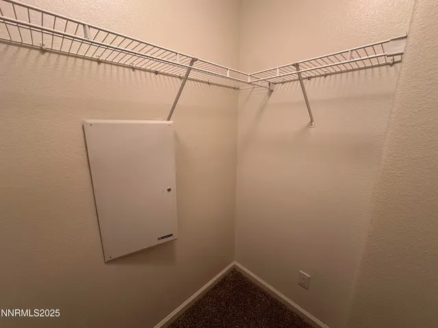 a view of a room with racks on the wall