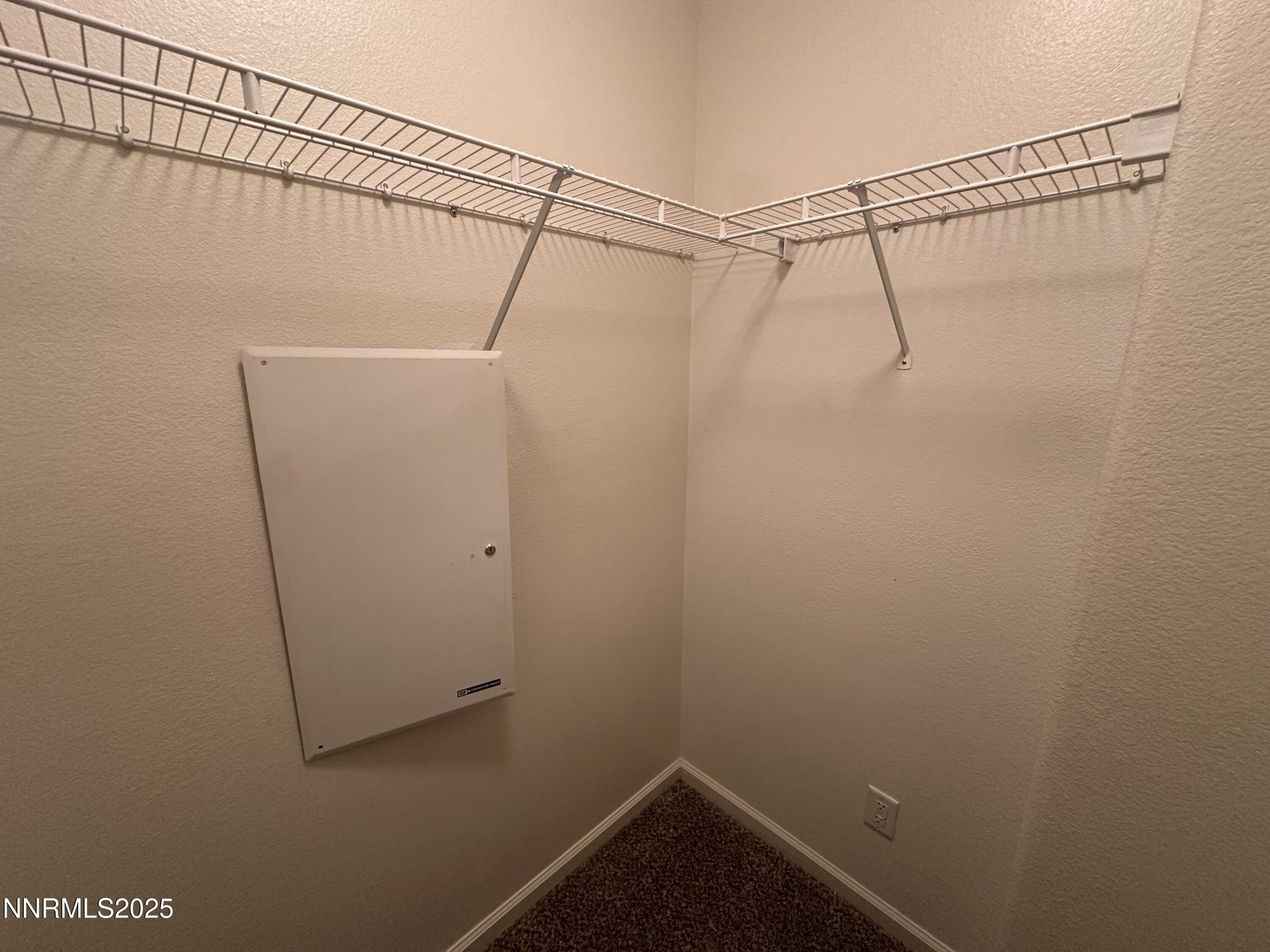 1625 Clover Hill Trail Reno, NV 89523 - Photo 23 of 41 a view of a room with racks on the wall