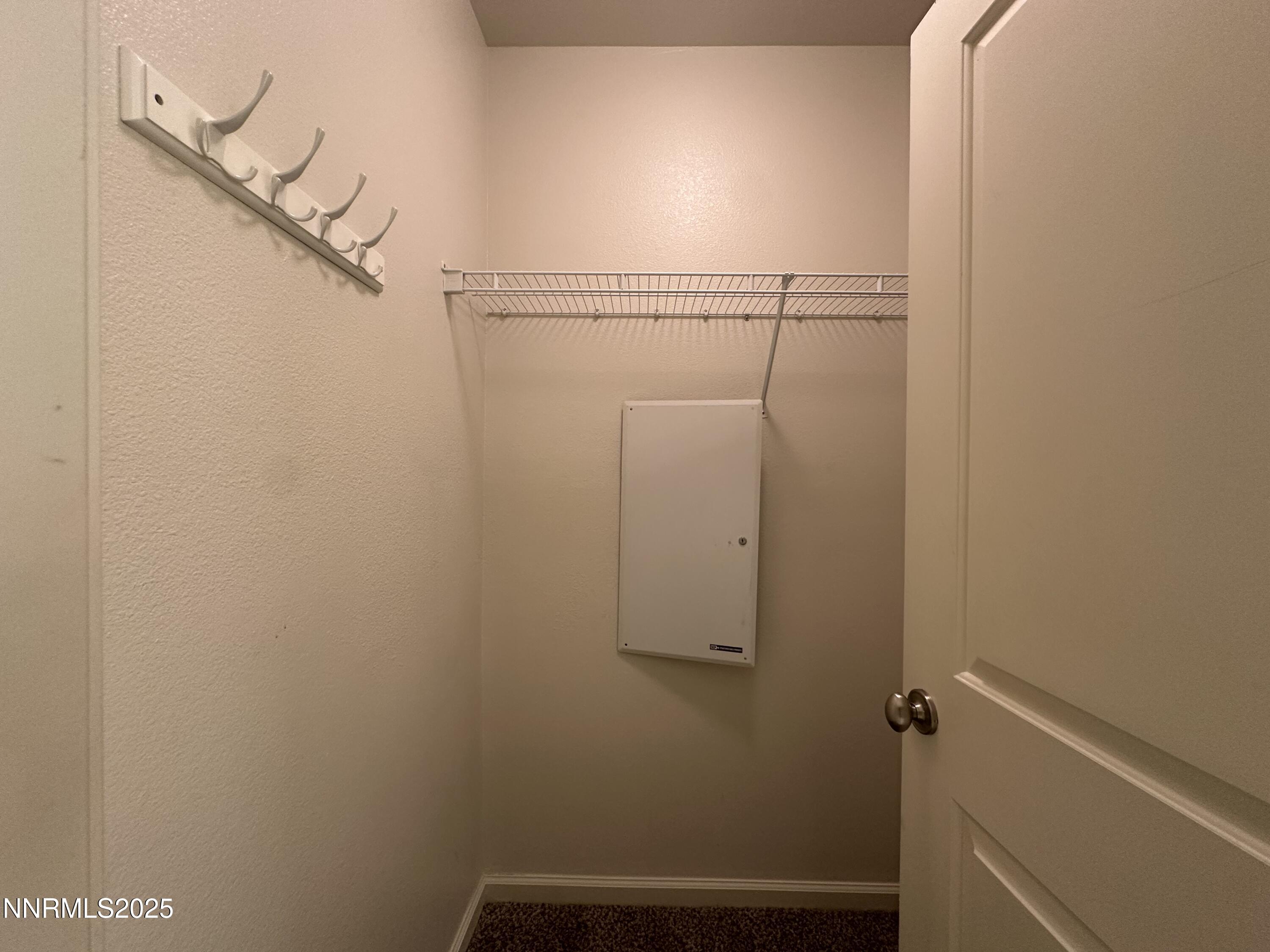 1625 Clover Hill Trail Reno, NV 89523 - Photo 24 of 41 a view of small space with racks on the wall