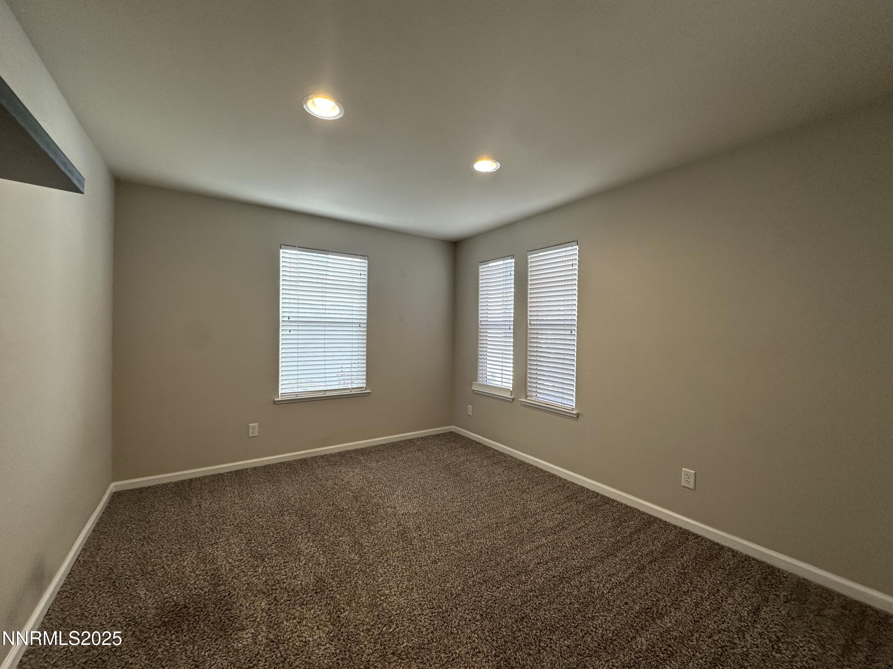 1625 Clover Hill Trail Reno, NV 89523 - Photo 26 of 41 an empty room with windows