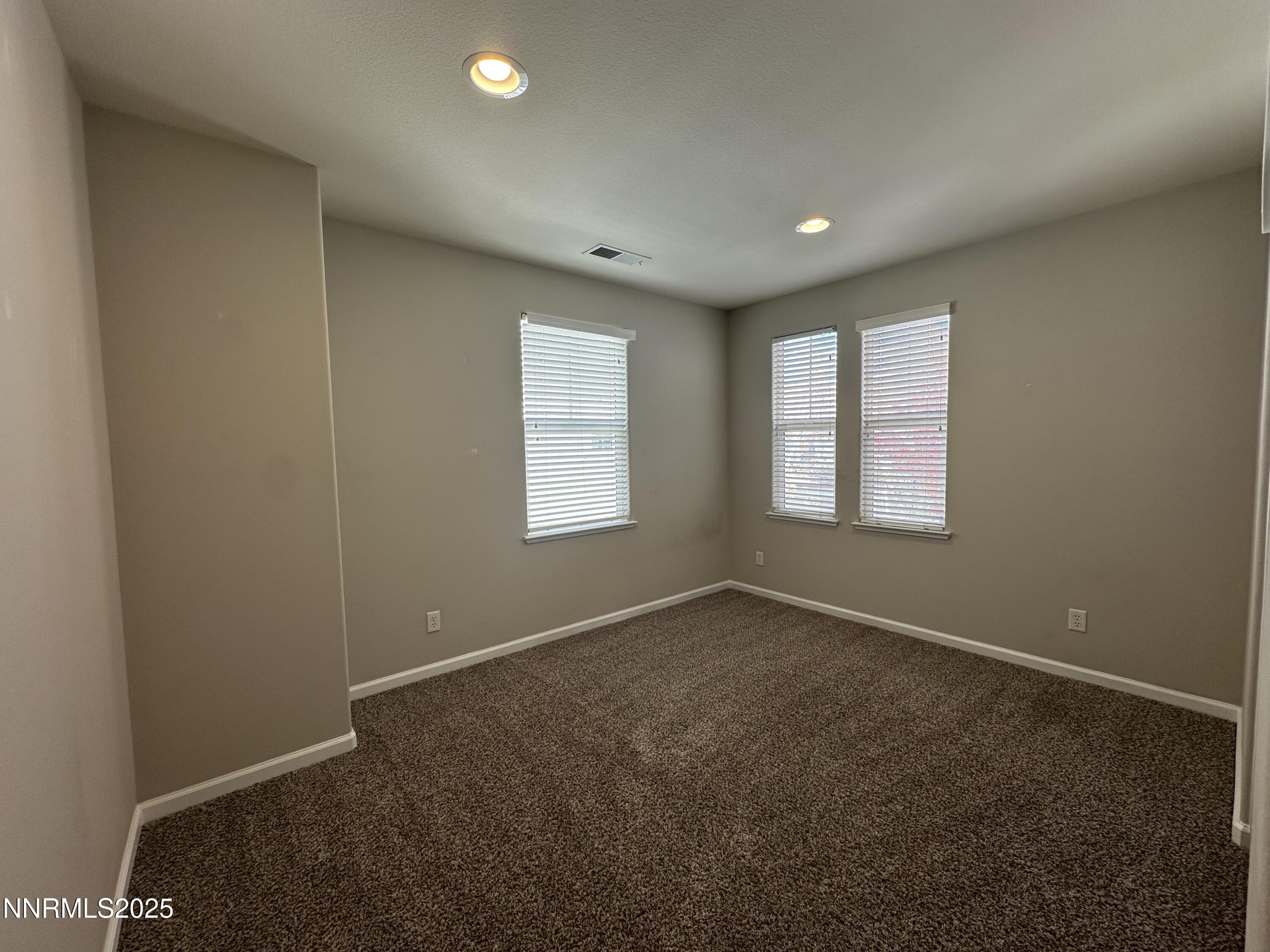 1625 Clover Hill Trail Reno, NV 89523 - Photo 31 of 41 an empty room with windows
