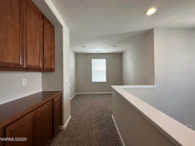 a view of room with walk in closet