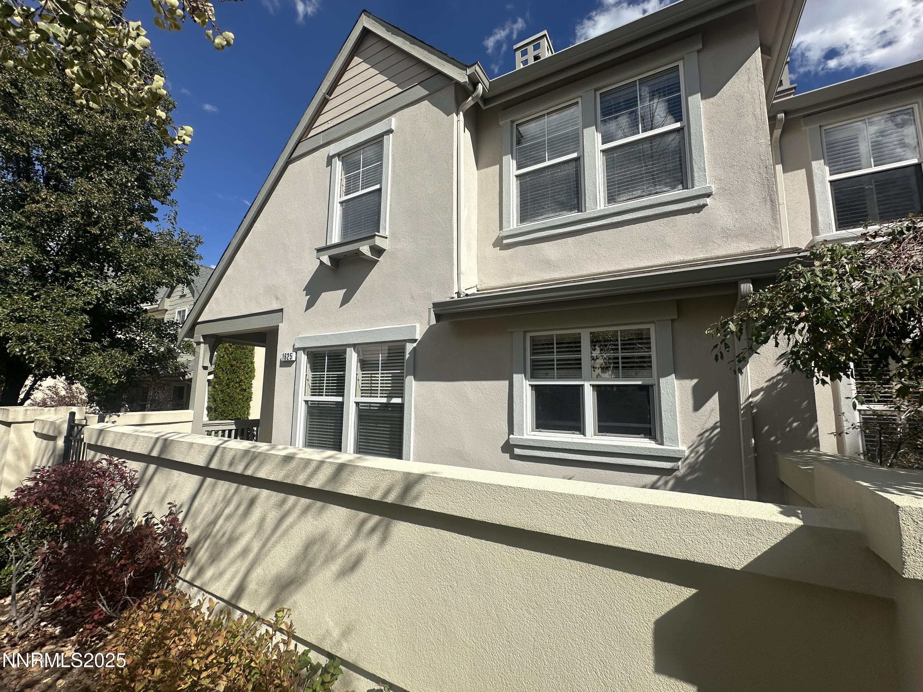 1625 Clover Hill Trail Reno, NV 89523 - Photo 4 of 41 a front view of a house with a yard