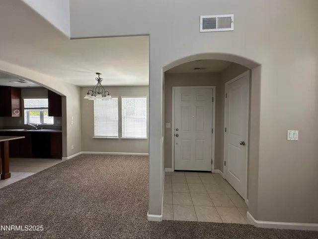 a view of livingroom with kitchen