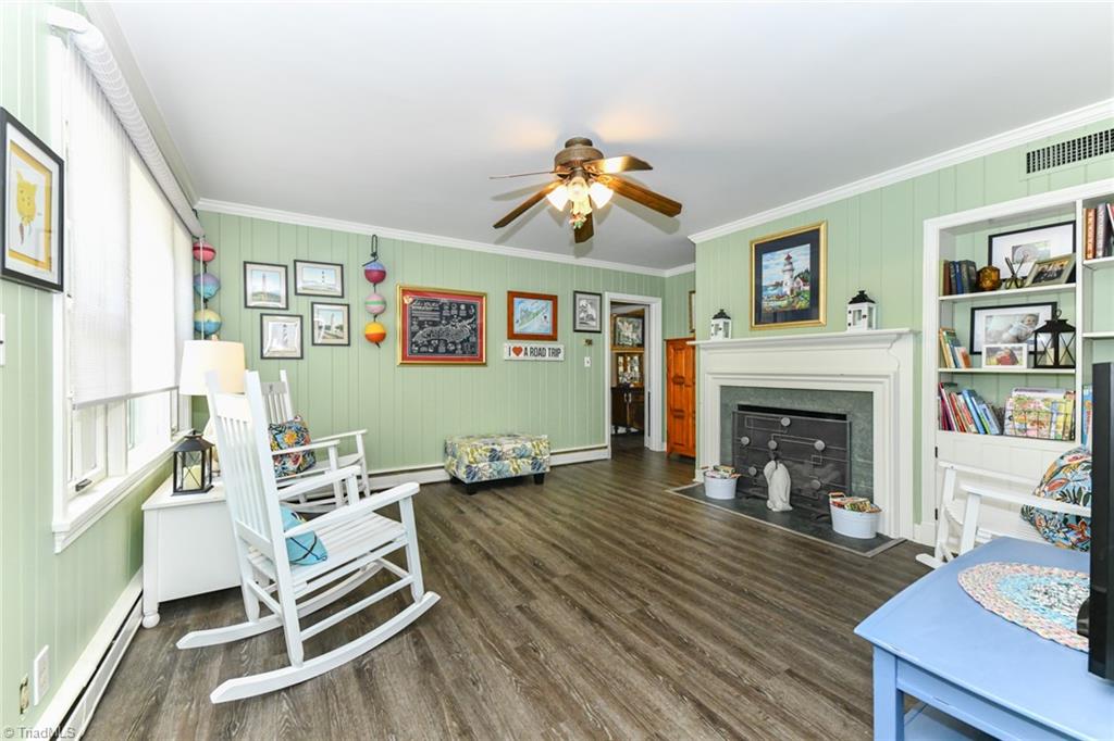 3626 Fieldview Road Pleasant Garden, NC 27313 - Photo 13 of 41 The den area offers the second gas log fireplace. Perfect as a playroom or cozy reading or study area.