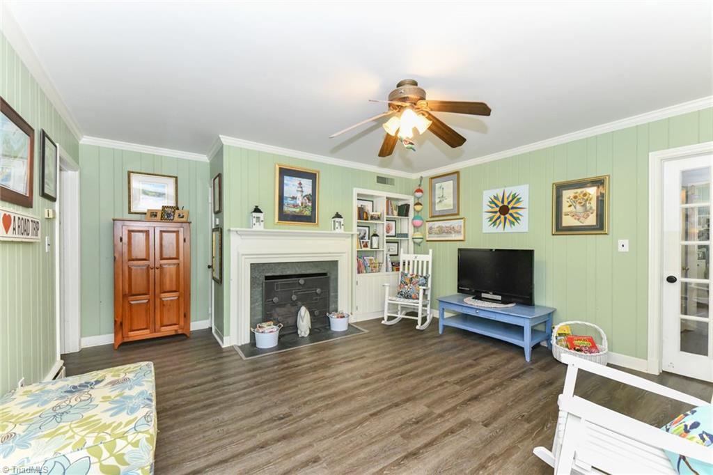 3626 Fieldview Road Pleasant Garden, NC 27313 - Photo 14 of 41 Built-ins beside the fireplace add to the charm of this beautiful home!