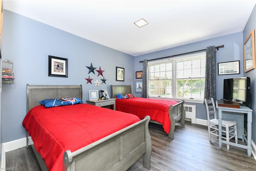 3626 Fieldview Road Pleasant Garden, NC 27313 - Photo 22 of 41 This bedroom has a door leading directly to the hall bath for privacy.