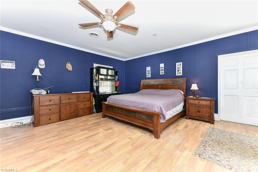 3626 Fieldview Road Pleasant Garden, NC 27313 - Photo 24 of 41 This 4th bedroom is currently being used as a bonus room. Has a nice size closet and leads to the sunroom.