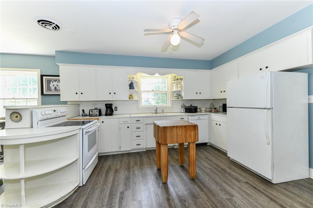 3626 Fieldview Road Pleasant Garden, NC 27313 - Photo 10 of 41 The kitchen has a great work space feeling open. Pantry is behind in this photo.
