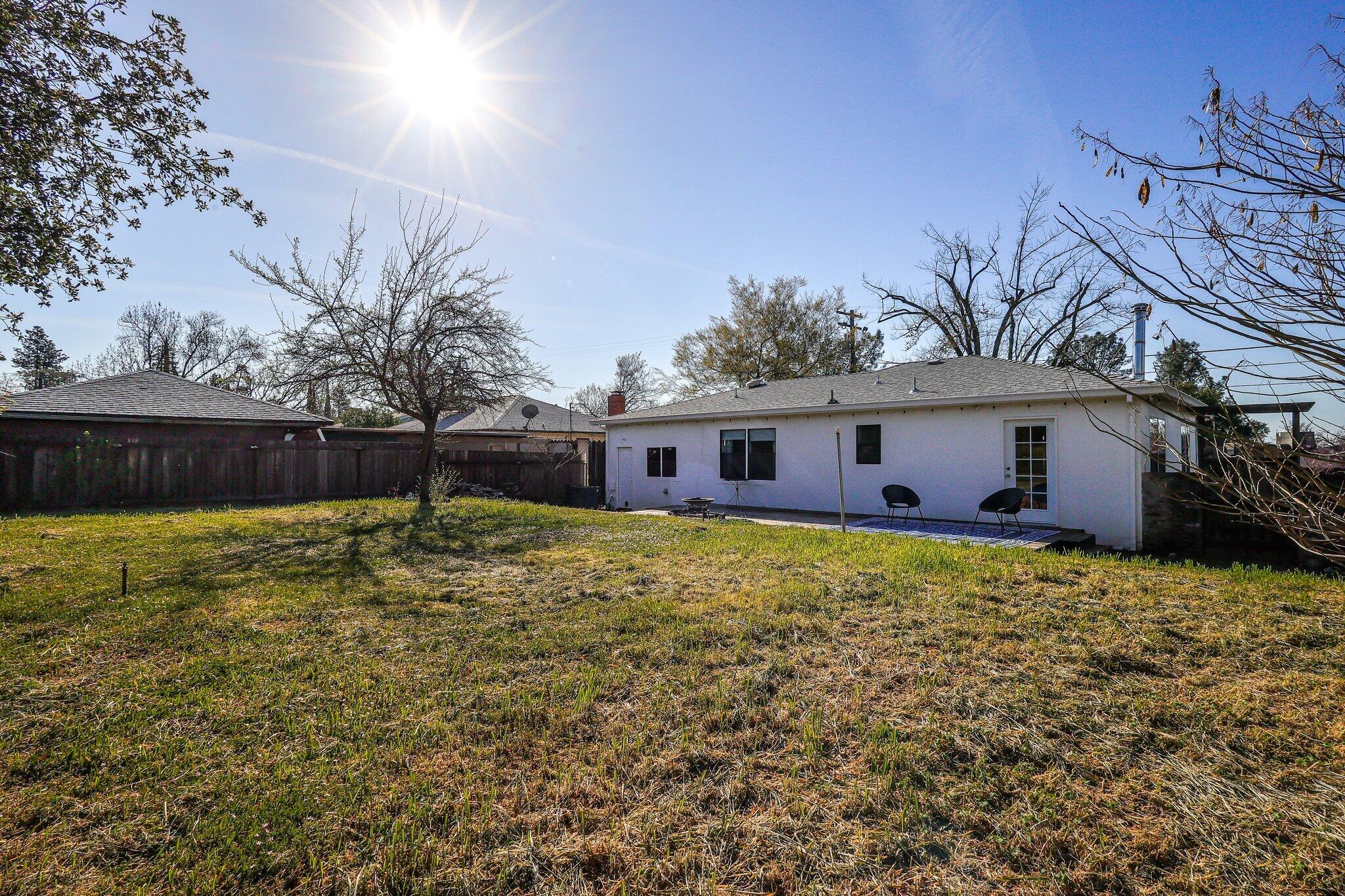 1750 Barbara Road Redding, CA 96003 - Photo 18 of 21 a view of a house with a yard