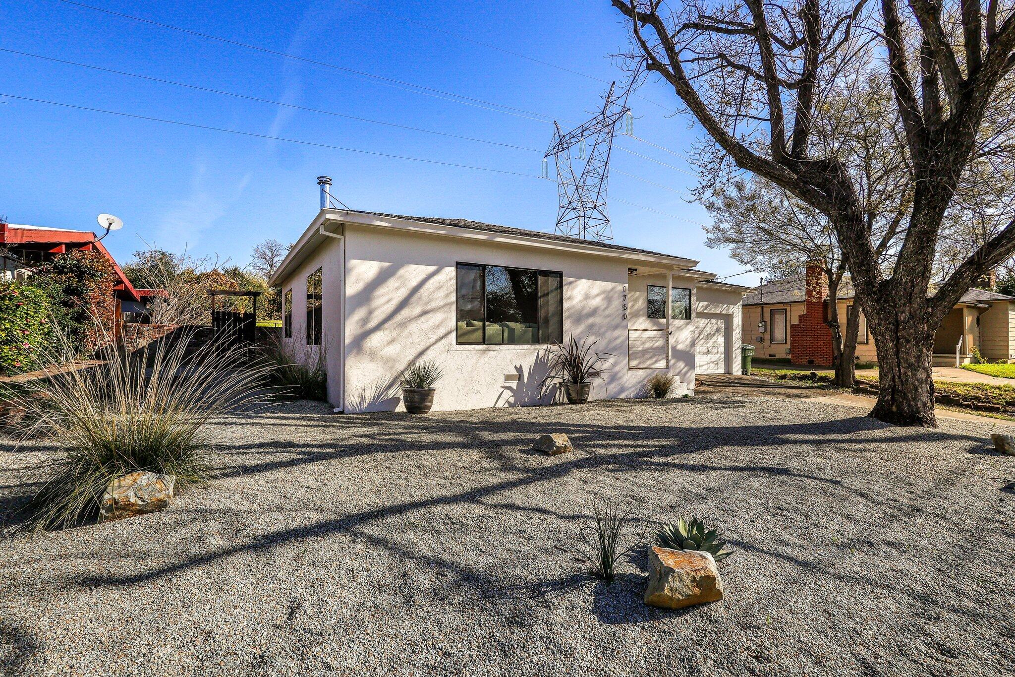 1750 Barbara Road Redding, CA 96003 - Photo 20 of 21 a view of a house with a yard