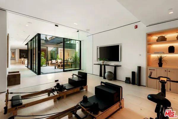 a view of a room with gym equipment