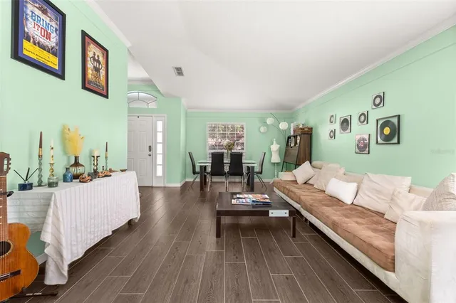 a living room with furniture and a window