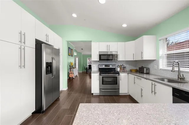 a bedroom with a bed and a furniture