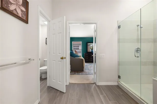 a view of a patio with a table and chairs