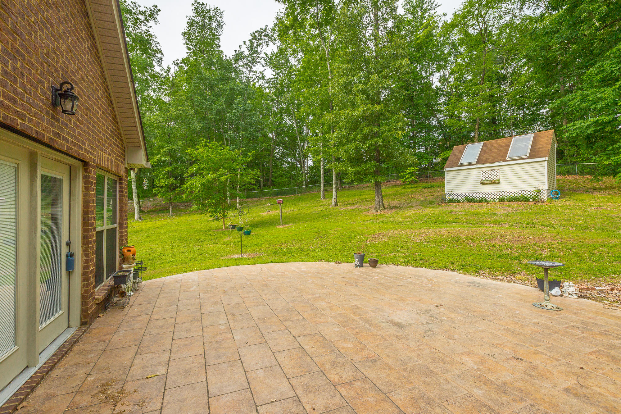 7929 Gann Road Hixson, TN 37343 - Photo 26 of 29 Patio and out building